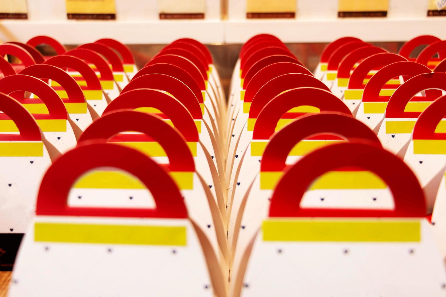 row of colorful paper bags photo