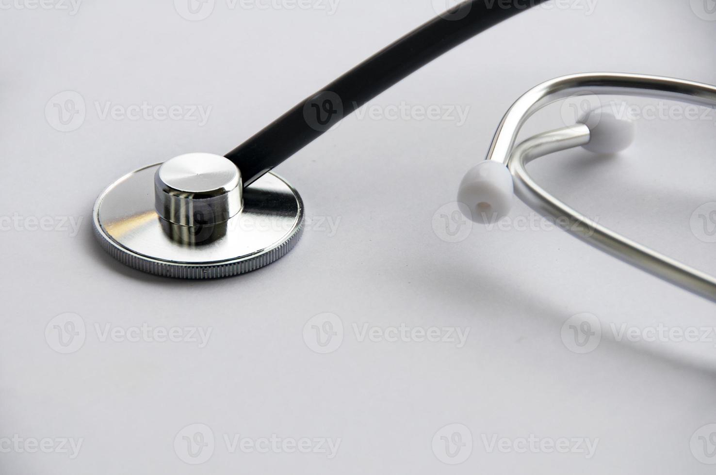 Stethoscope on white cover background with customizable space for text. Copy space and health concept photo