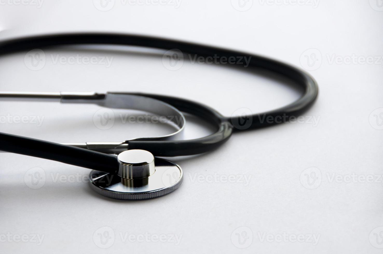Stethoscope on white cover background with customizable space for text. Copy space and health concept photo