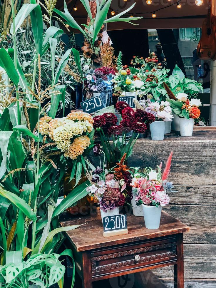 Small busines florist shop with trendy bouquets photo