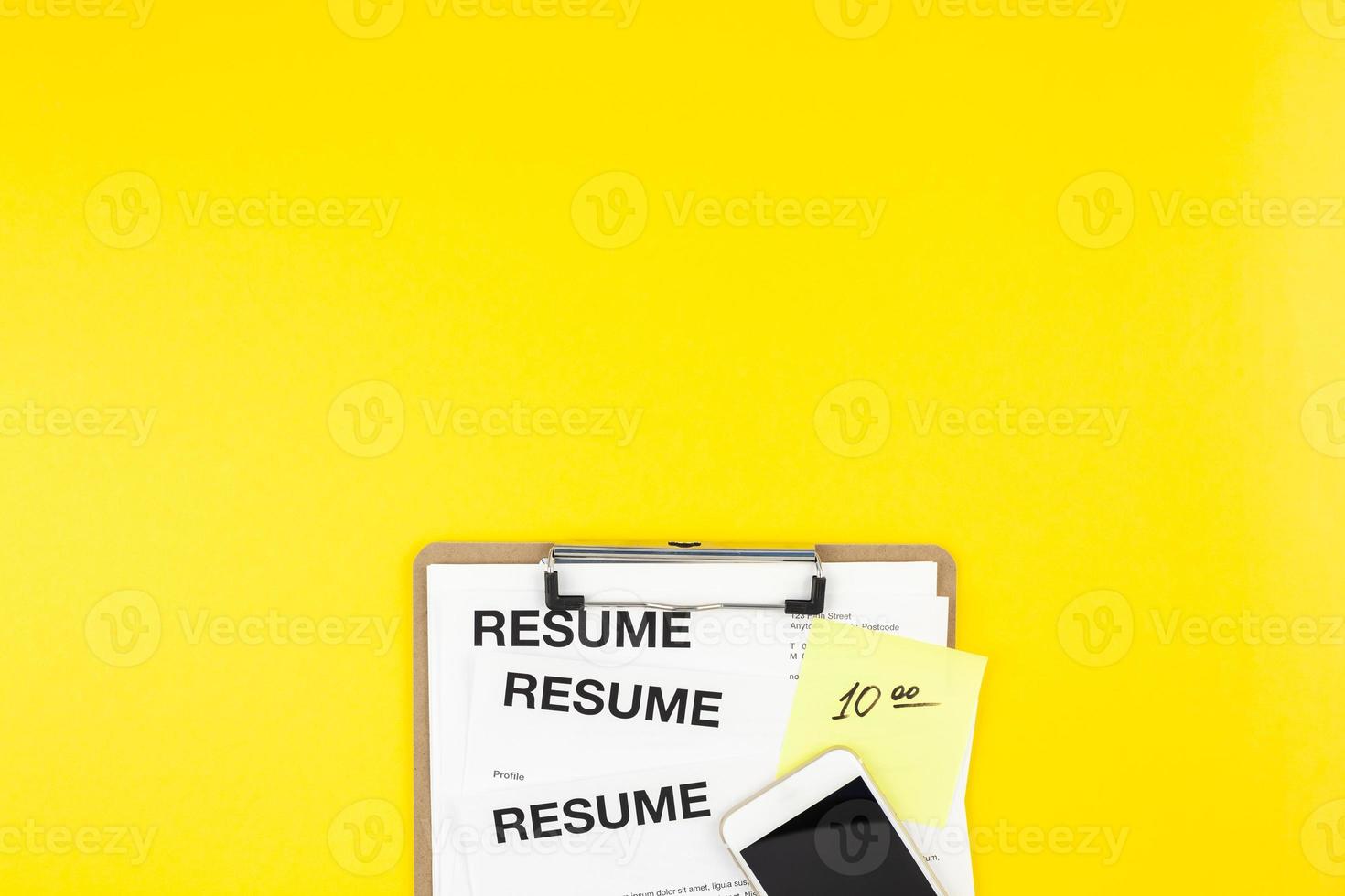 We are hiring flat lay on yellow background photo