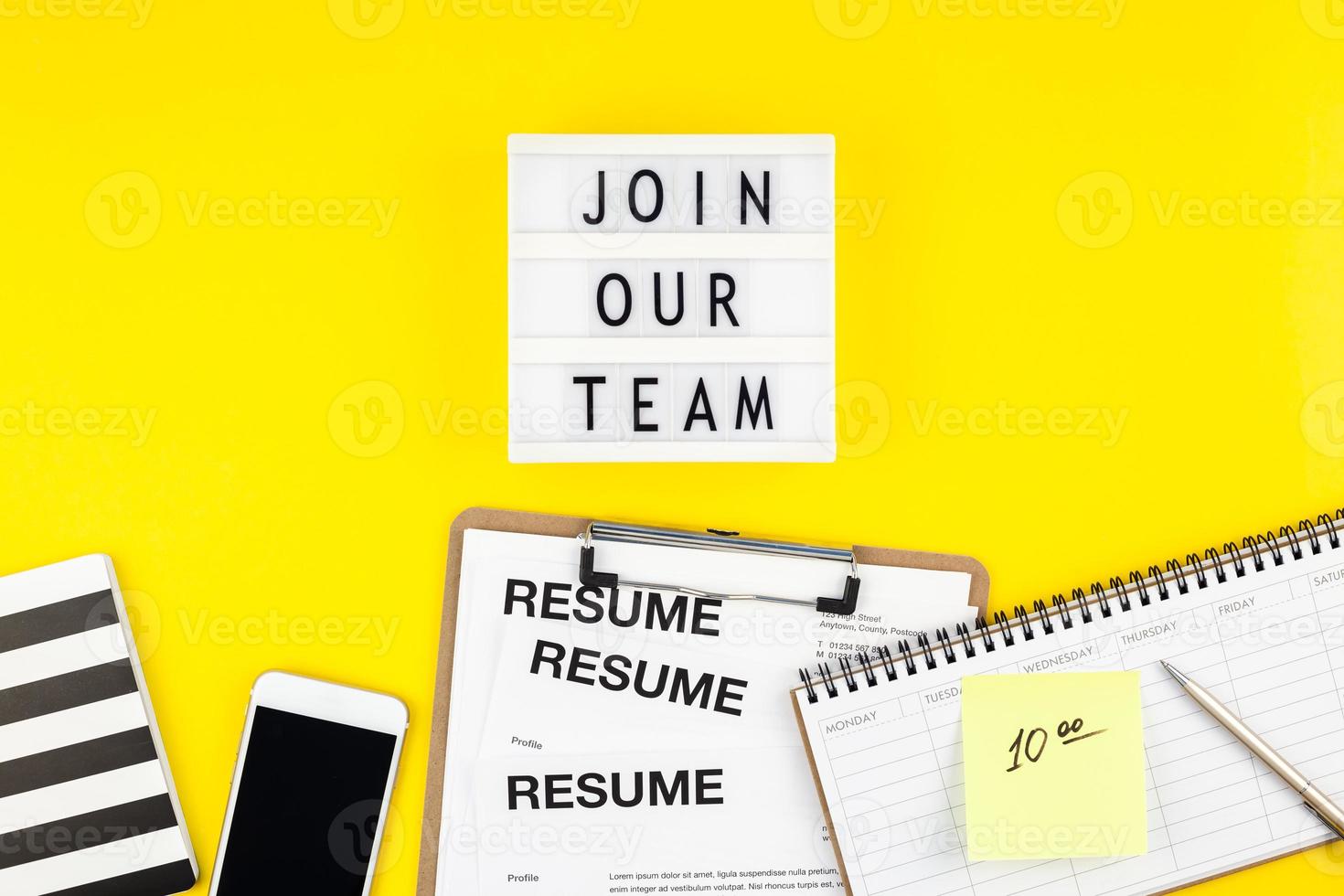 Join our team flat lay on yellow background photo