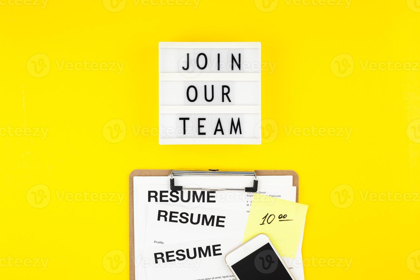 Join our team flat lay on yellow background photo