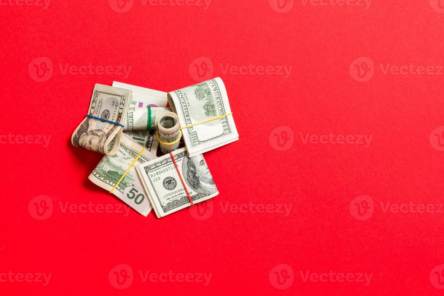 Many Stack of 100 dollar bills. Isolated on colored background top wiev with copy space photo