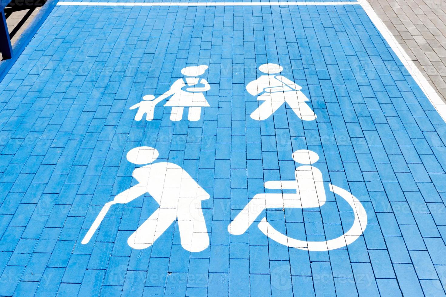 Sign, parking for the disabled in the parking lot of the shopping center photo