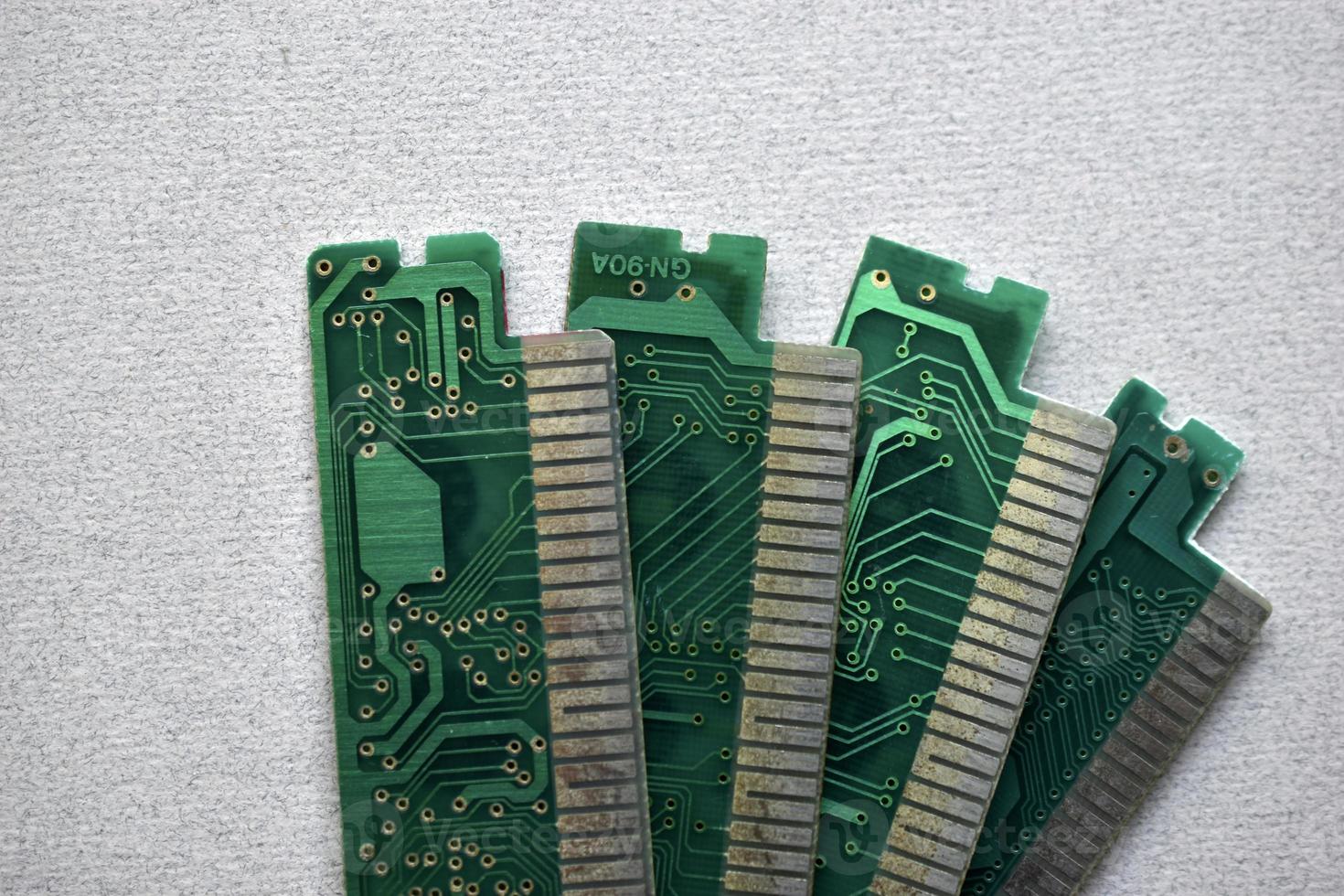 Old electronic boards for retro games. Cartridges for retro game consoles. photo