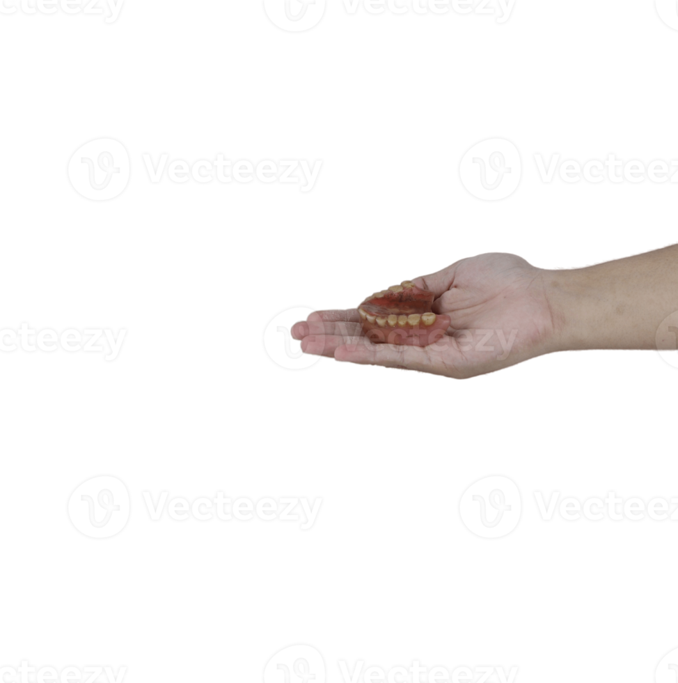 hands holding dirty dentures png