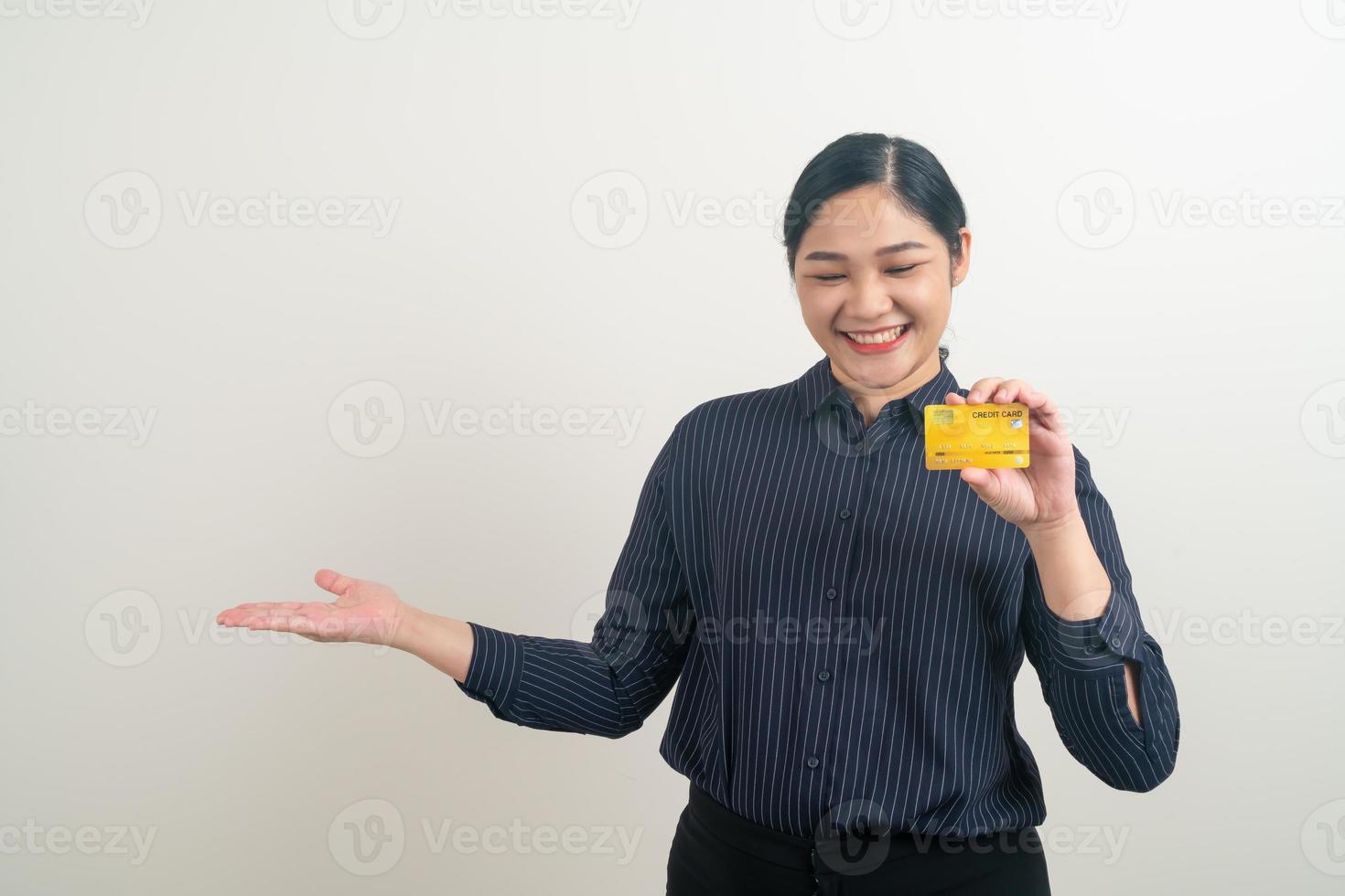 Asian woman holding credit card with white background photo