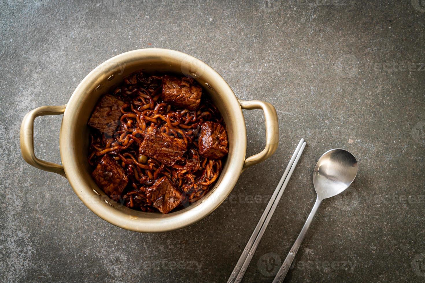 Jjapaguri or Chapaguri, Korean Black Beans Spicy Noodles with Beef photo