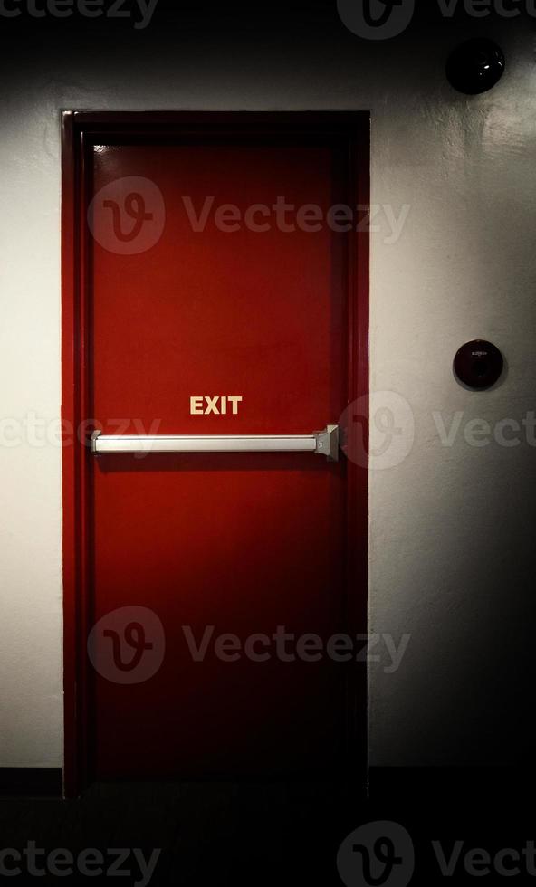 Emergency fire exit door. Red Color metal material. photo