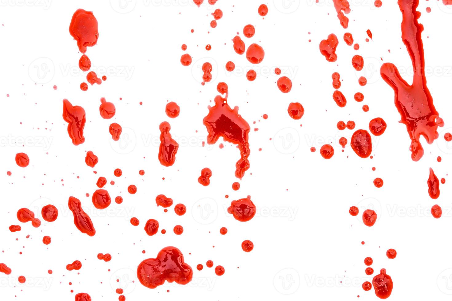 closeup drops of red blood isolated on white background,abstract pattern photo