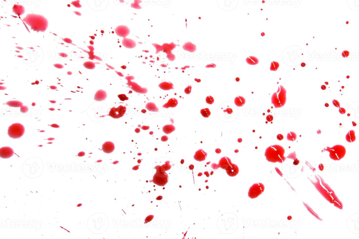 closeup drops of red blood isolated on white background,abstract pattern photo