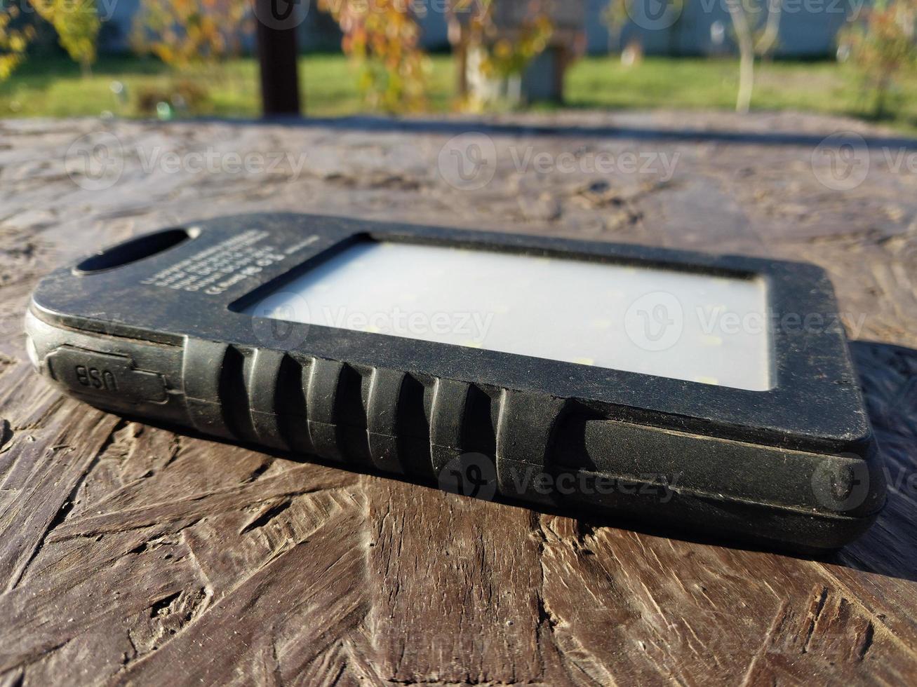 Travel power bank on a solar battery photo