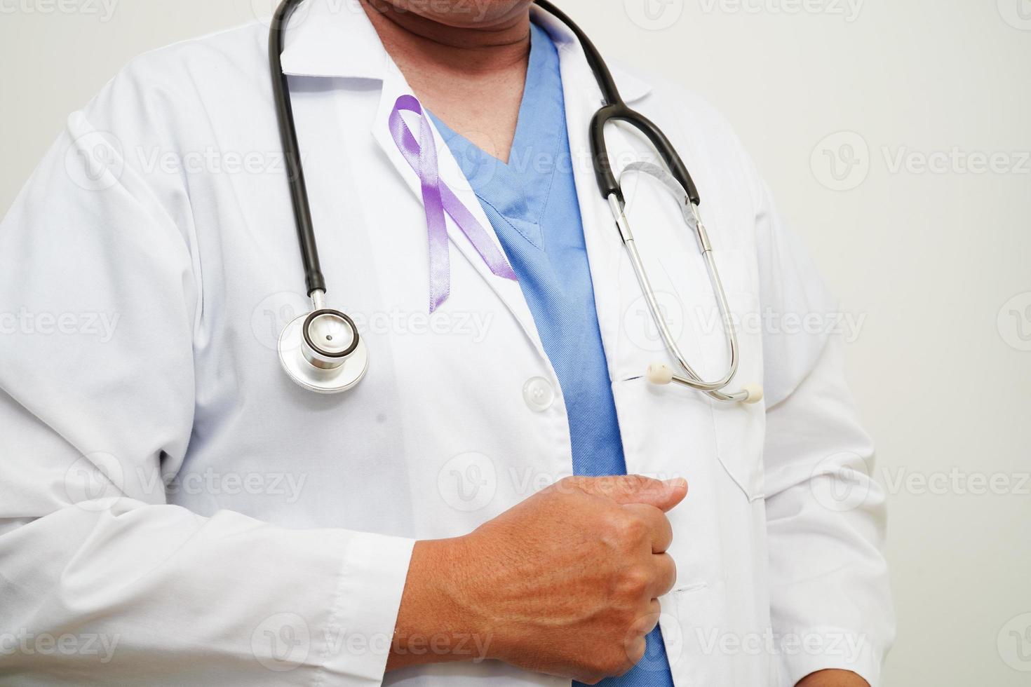 Asian woman doctor with purple ribbon, World Pancreatic Cancer day or World Alzheimer day. photo