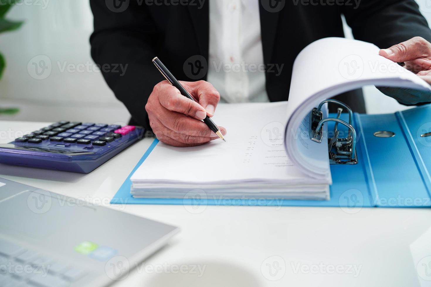 Business woman busy working with documents in office. photo
