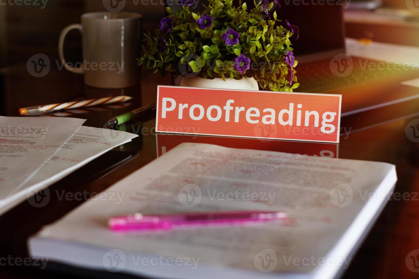 proofreading English card over blurred text photo