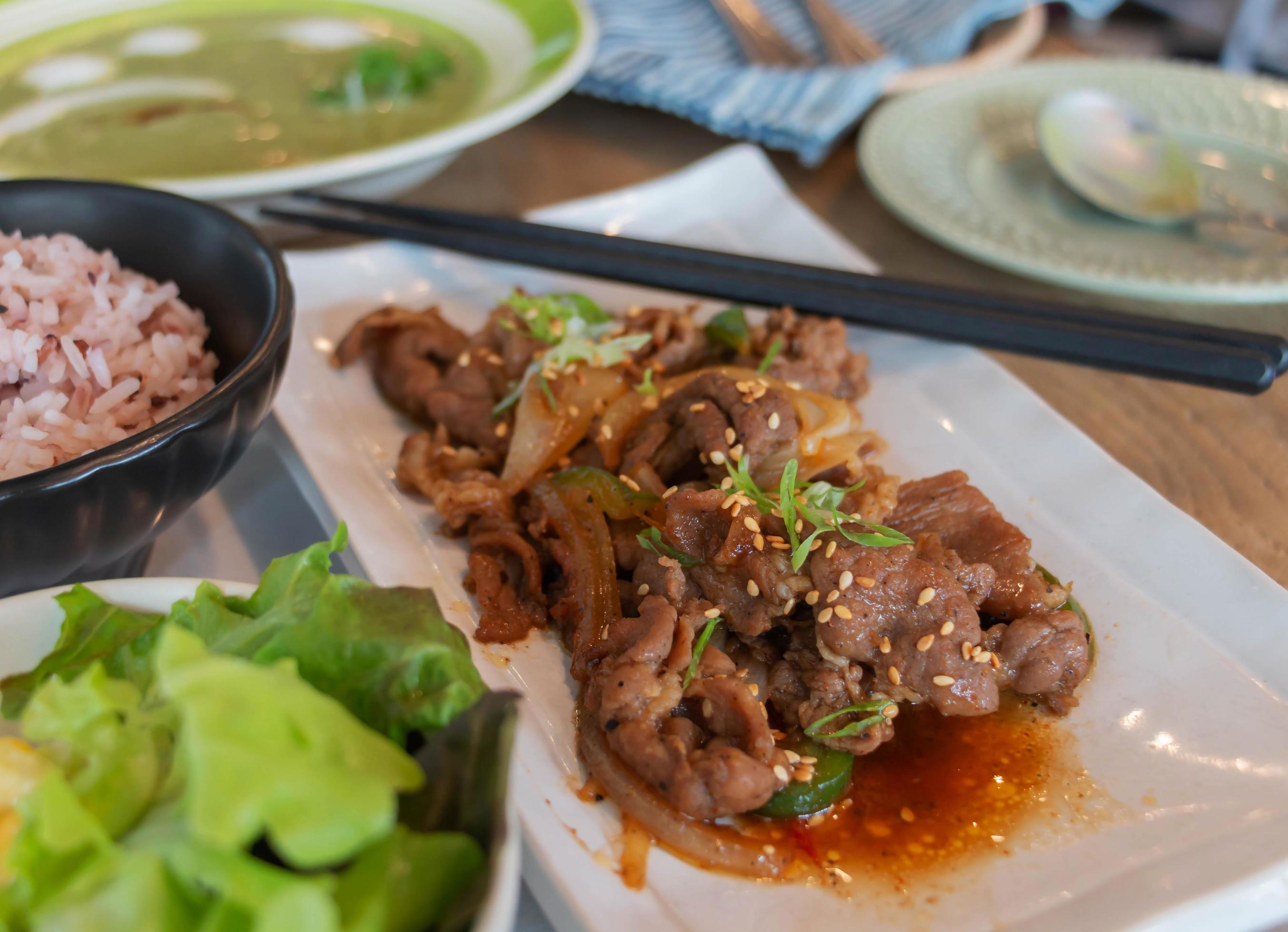 stir fried korean pork dish 13394660 Stock Photo at Vecteezy