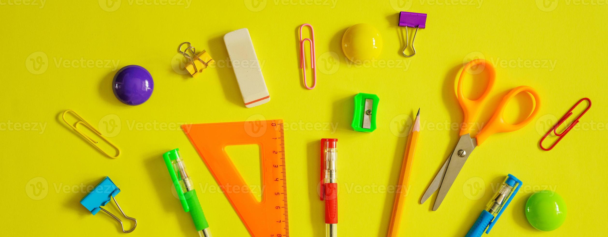 Tools for school creative work on a yellow background stationery, corondash pen photo