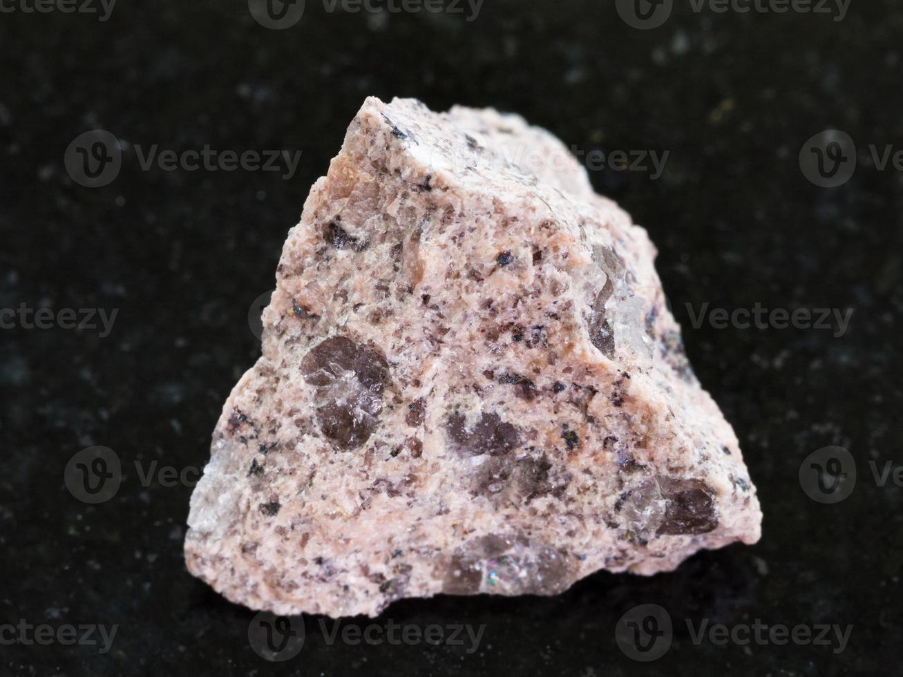 raw Granite stone on dark granite background 13401923 Stock Photo at