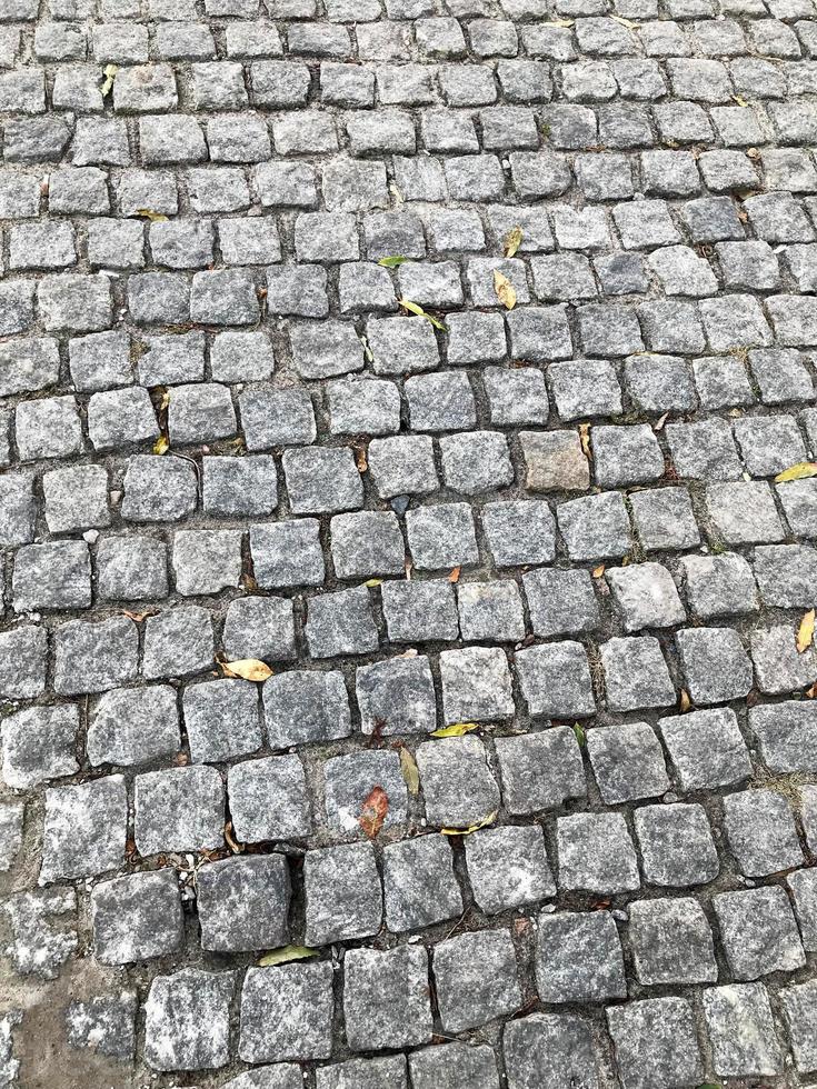 pequeña, vieja, baldosa de piedra en el suelo, fondo foto