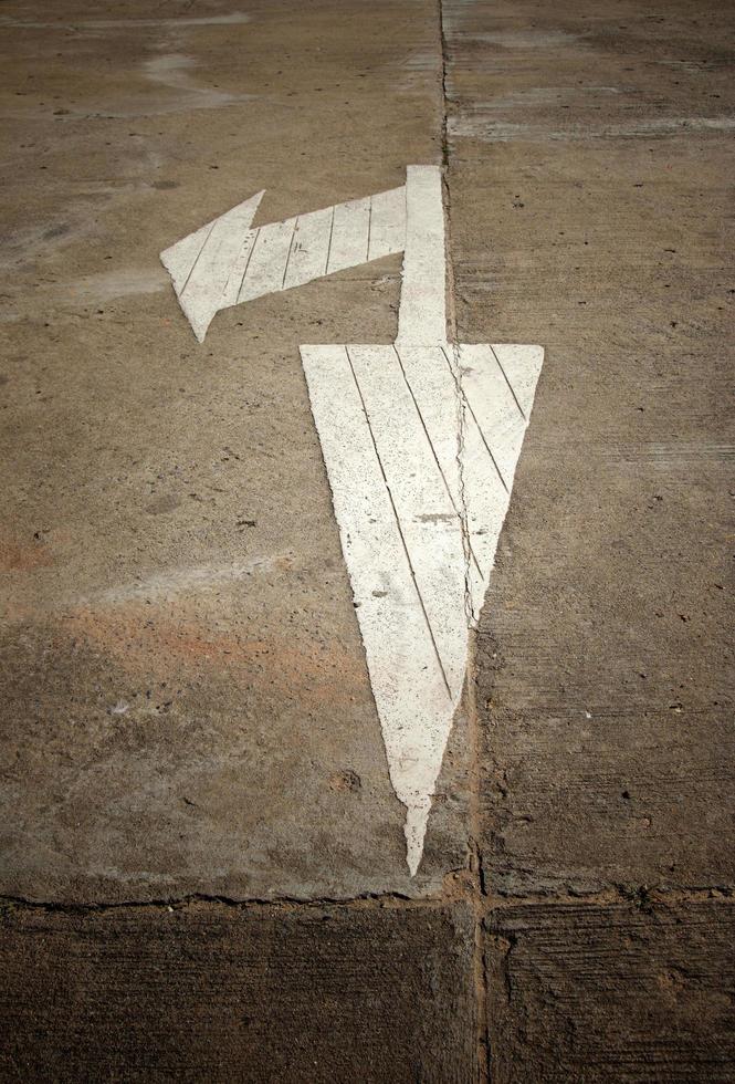 white arrow marking on road photo