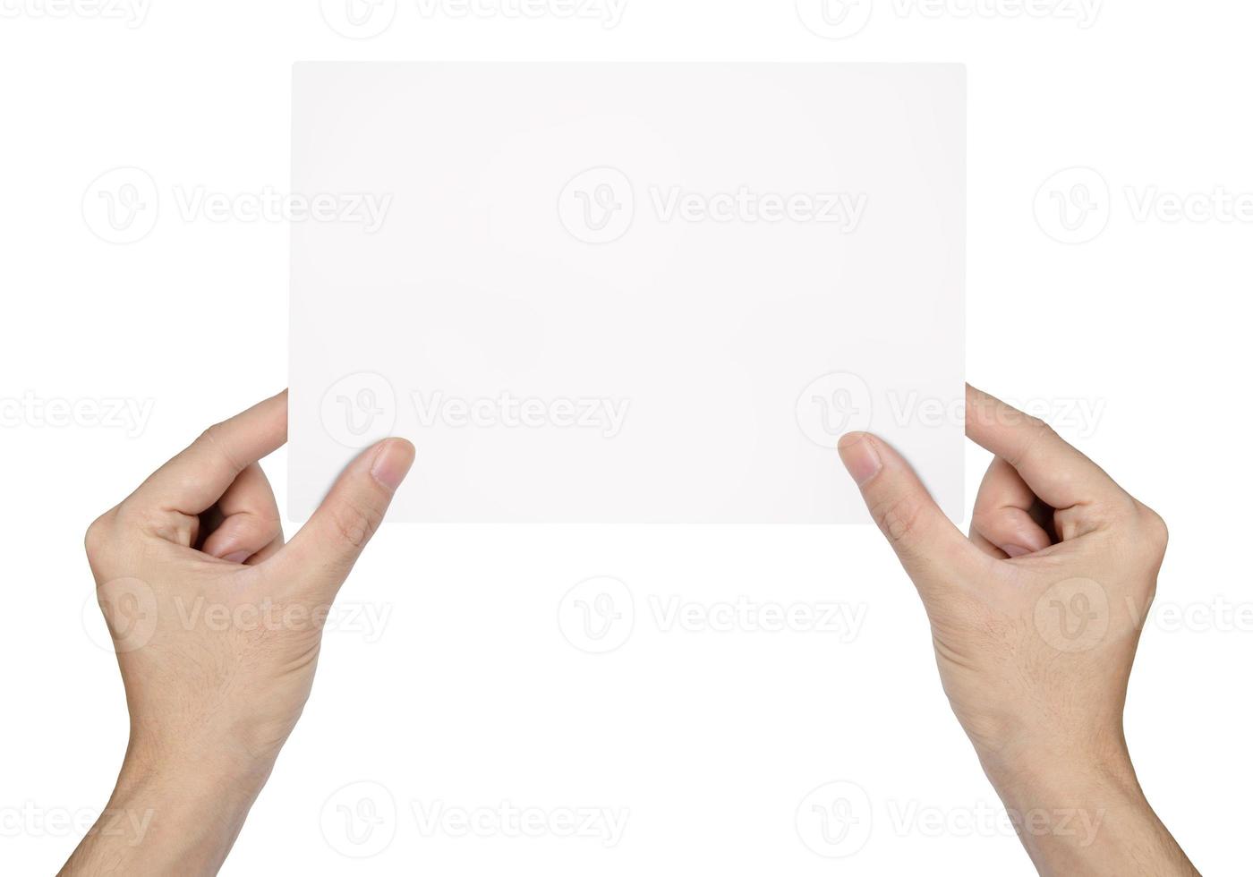 Businessman's hand holding blank paper  isolated on white background photo