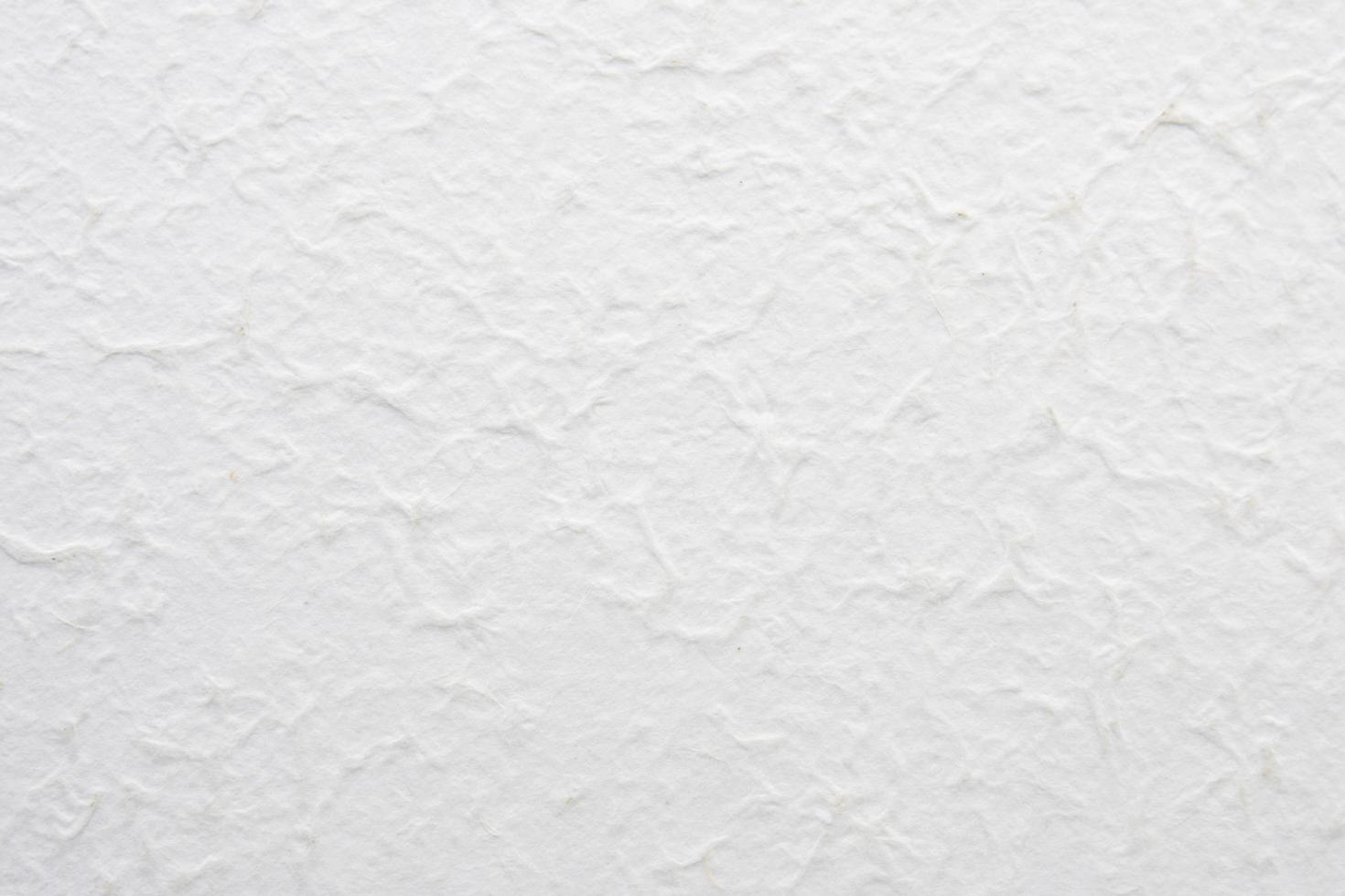 textura de papel blanco hecho a mano para el fondo foto