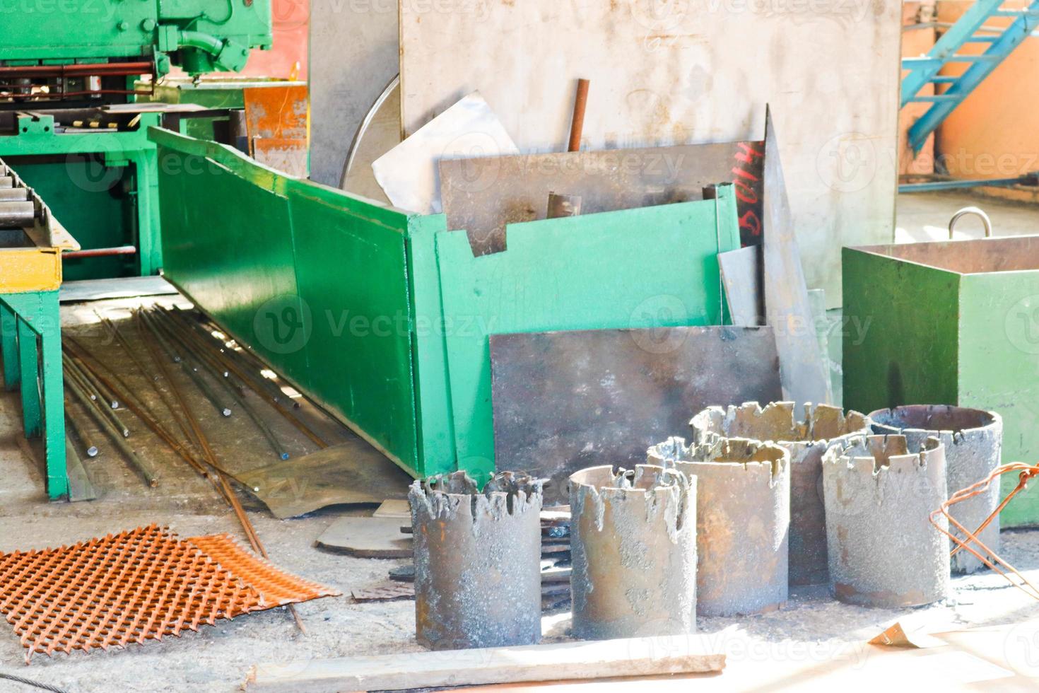 Warehouse, storage of iron scrap metal with mtall sheets and blanks ready for processing at the petrochemical, metallurgical industrial plant plant photo