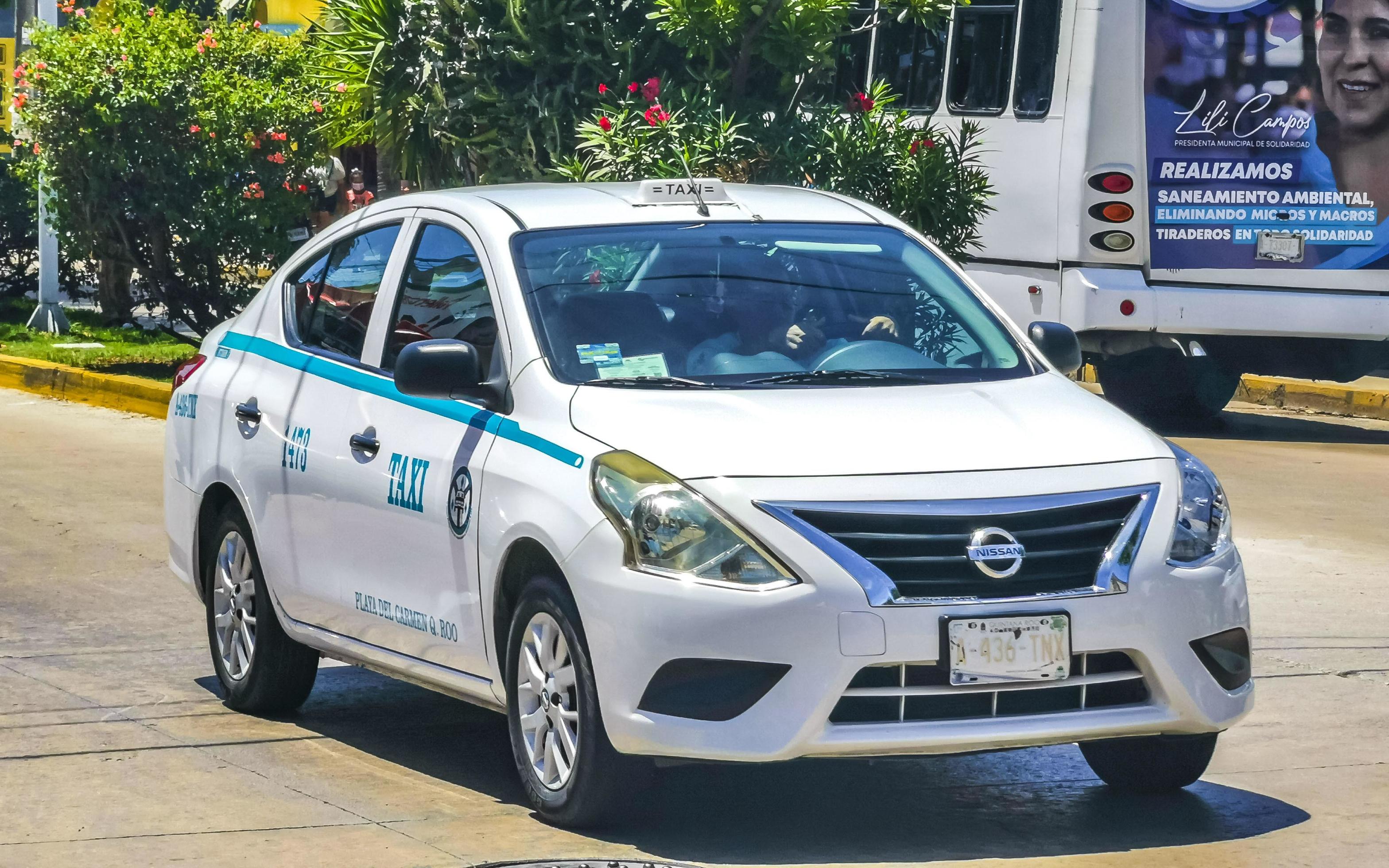 Playa del Carmen Quintana Roo Mexico 2022 White turquoise taxi cab car
