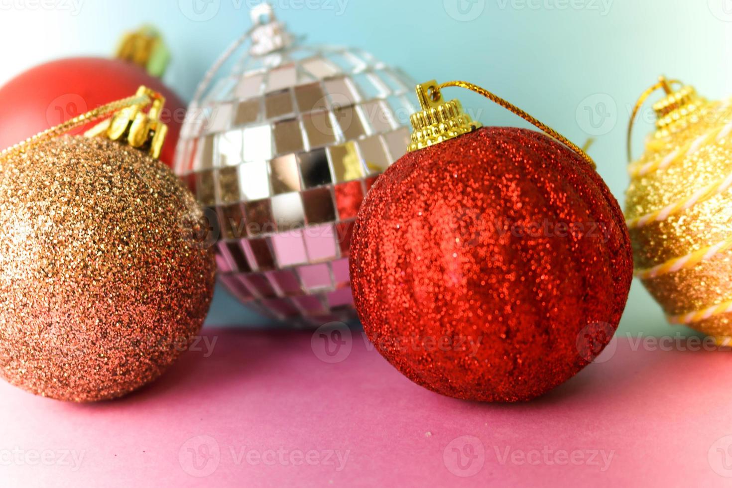 Many different multicolored colored red yellow silver gray white balls round glass winter shiny Christmas decorative beautiful xmas festive Christmas balls, Christmas tree toys background photo