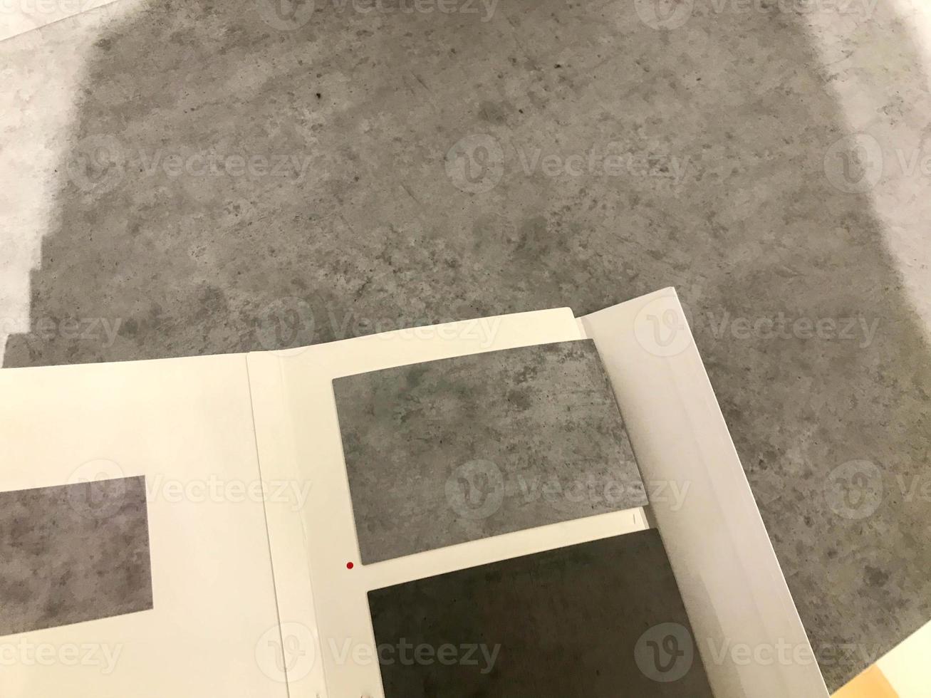 samples of gray materials for creating furniture. examples of gray shades for painting facades. wooden cabinets in different colors. stylish sleek material. gray graphite texture photo