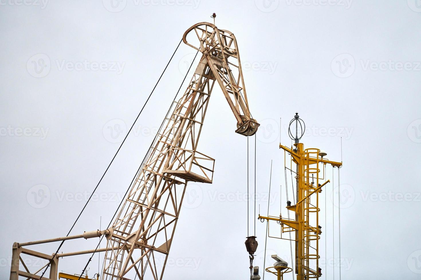 Cargo crane in container ship terminal, container yard photo