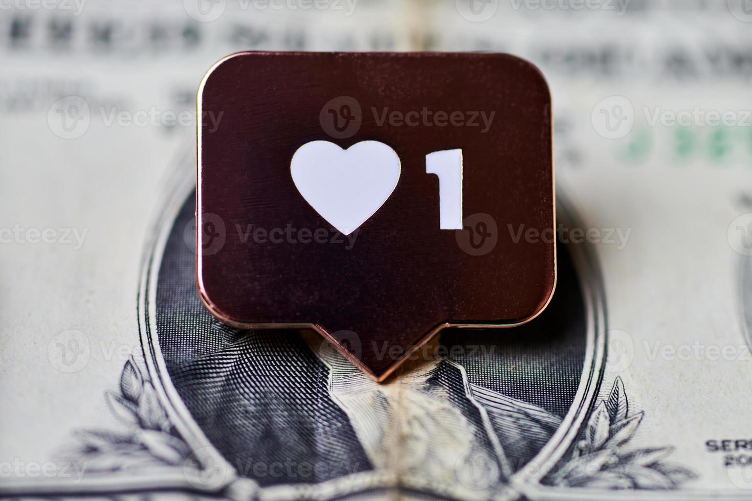 Like heart symbol on dollar photo