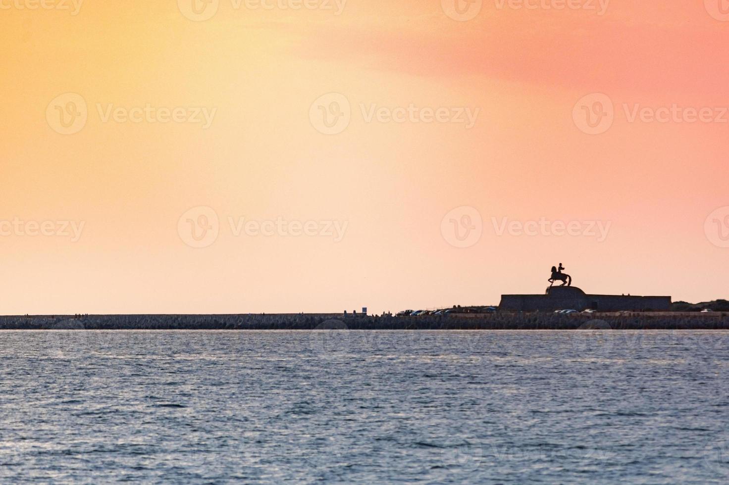 Baltic sunset. Amazing seascape colors. Dreams of travel and freedom. Sundown sky and claim weather. photo