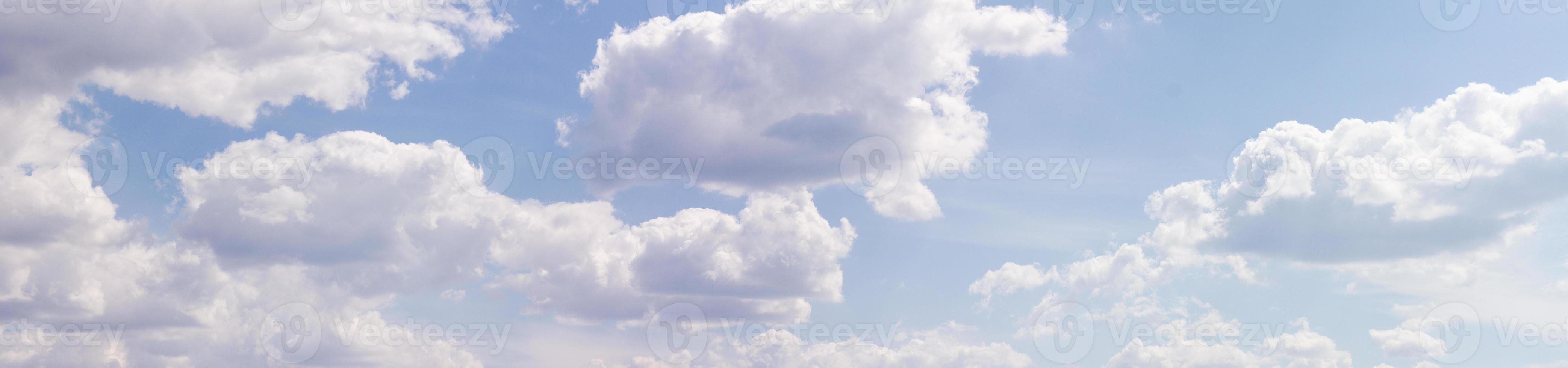 panorama of clouds. Banner against a blue sky with clouds. photo