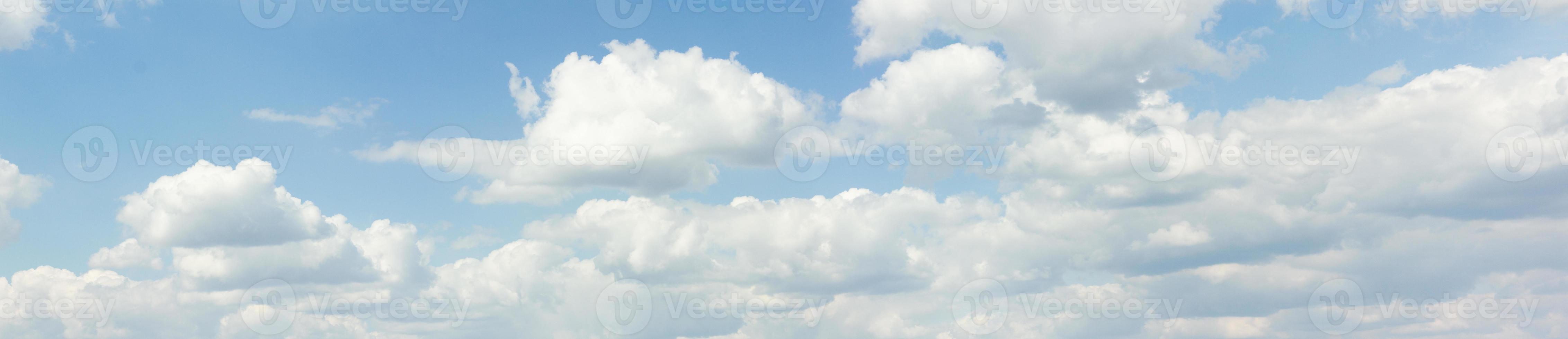 panorama of clouds. Banner against a blue sky with clouds. photo