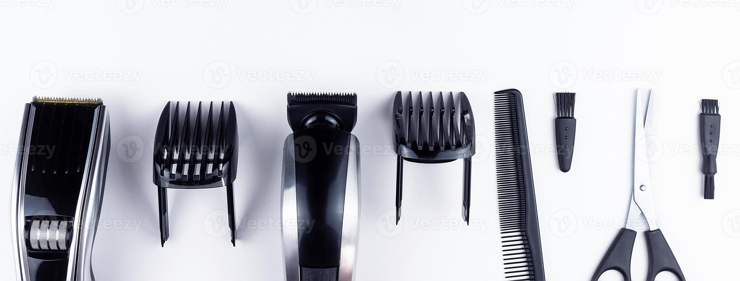scissors and combs on white photo
