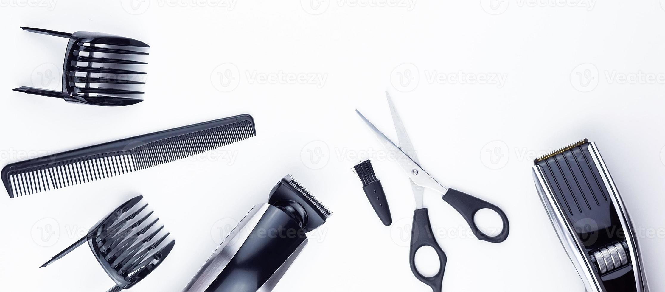 scissors and combs on white photo