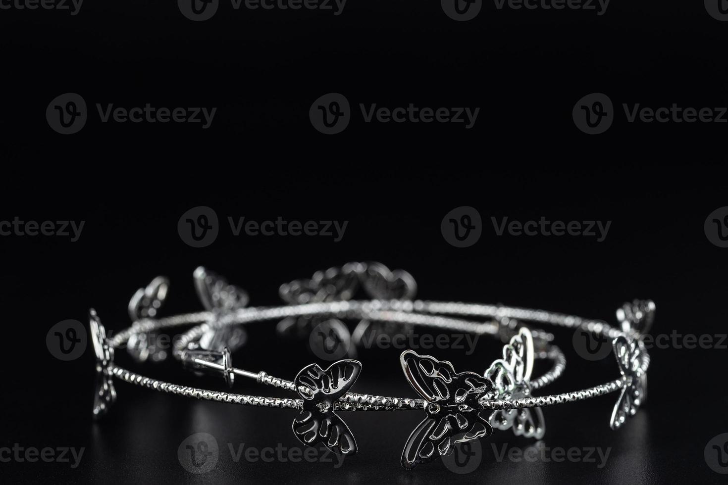 Jewelry earrings and costume jewelry on a black background photo