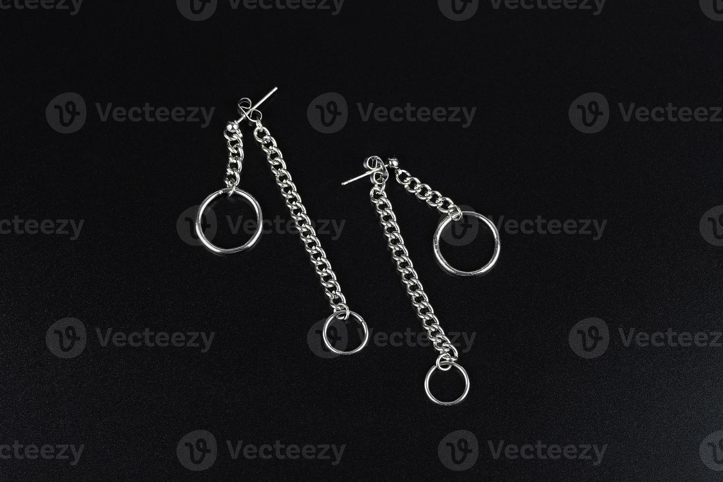 Jewelry earrings and costume jewelry on a black background photo
