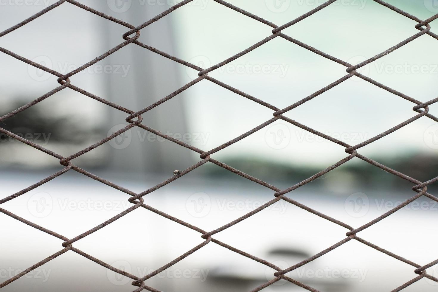 Parking lot of cars behind a metal fence 13410609 Stock Photo at Vecteezy