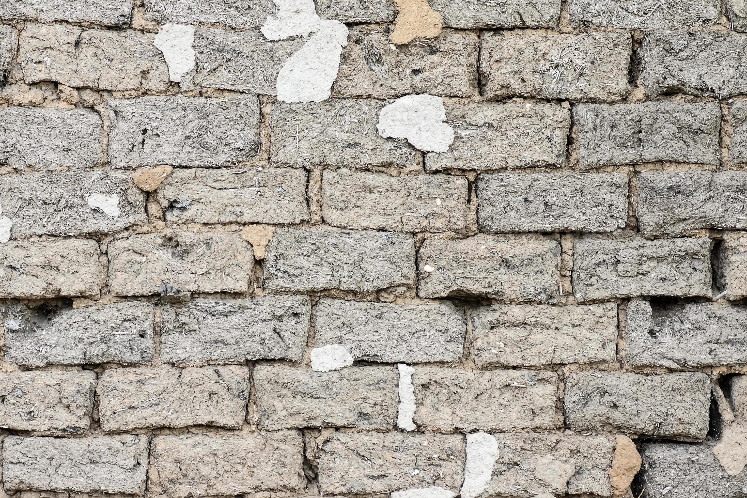 background and texture of an old wall made of clay and straw 13411195 Stock Photo at Vecteezy