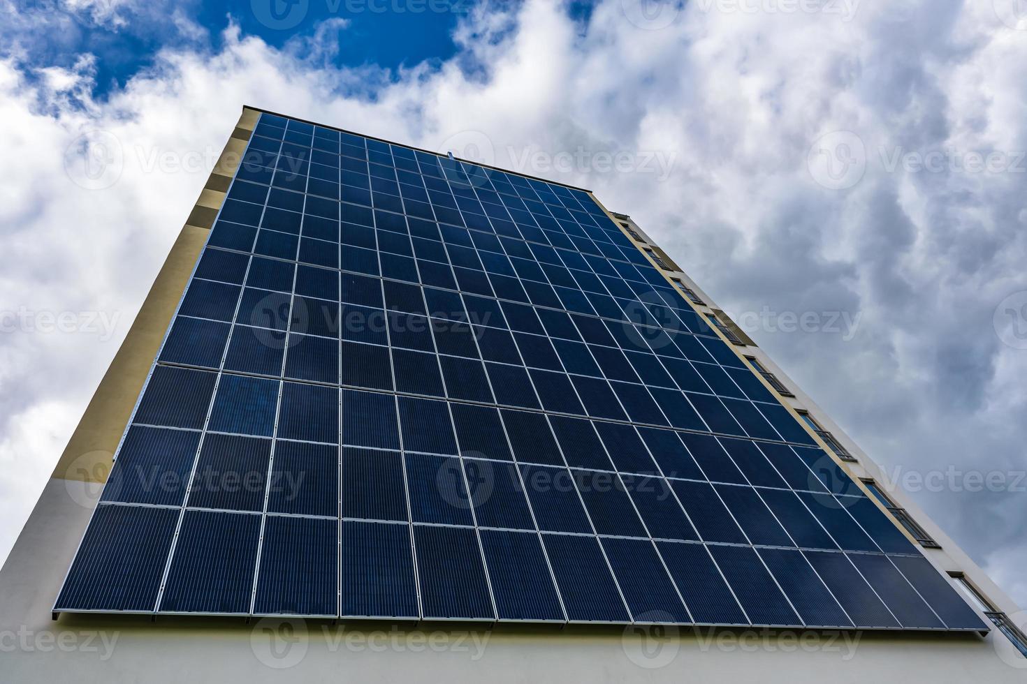 solar panels on the wall of a multistorey building. Renewable solar