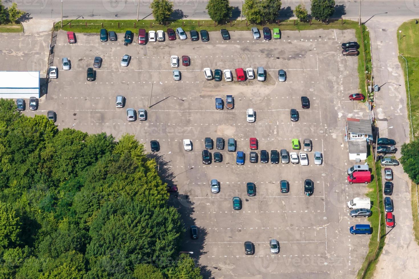 aerial view on large open air parking lot for cars for residents of area photo