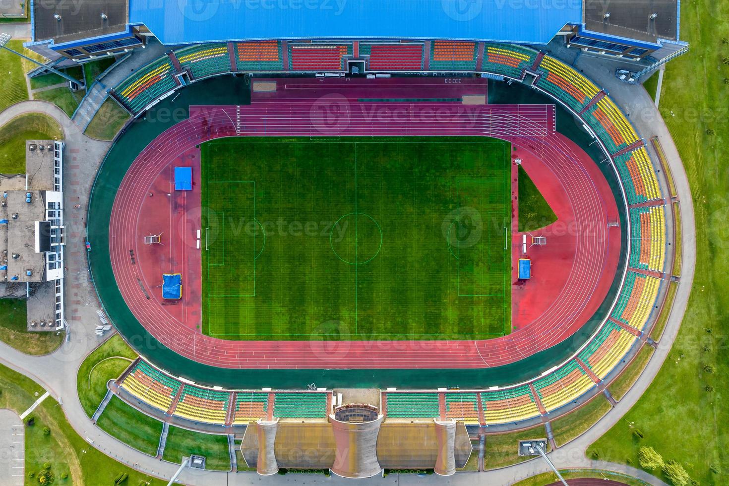 aerial panoramic view from above on empty stadium or sports complex, view on soccer field stadium from bird eye view photo