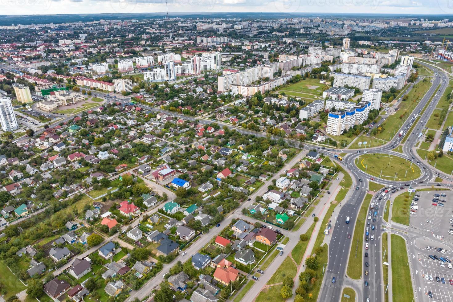 aerial panoramic view from a great height of a small provincial town with a private sector and high-rise apartment buildings photo