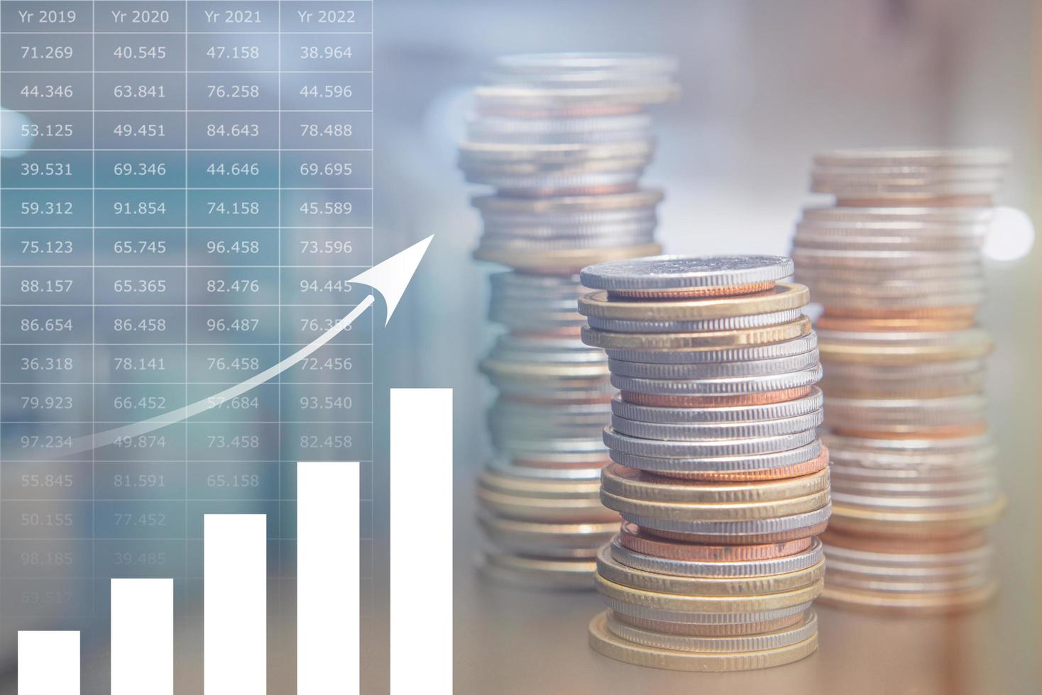 Double exposure stack of Thailand coins with profit graph photo