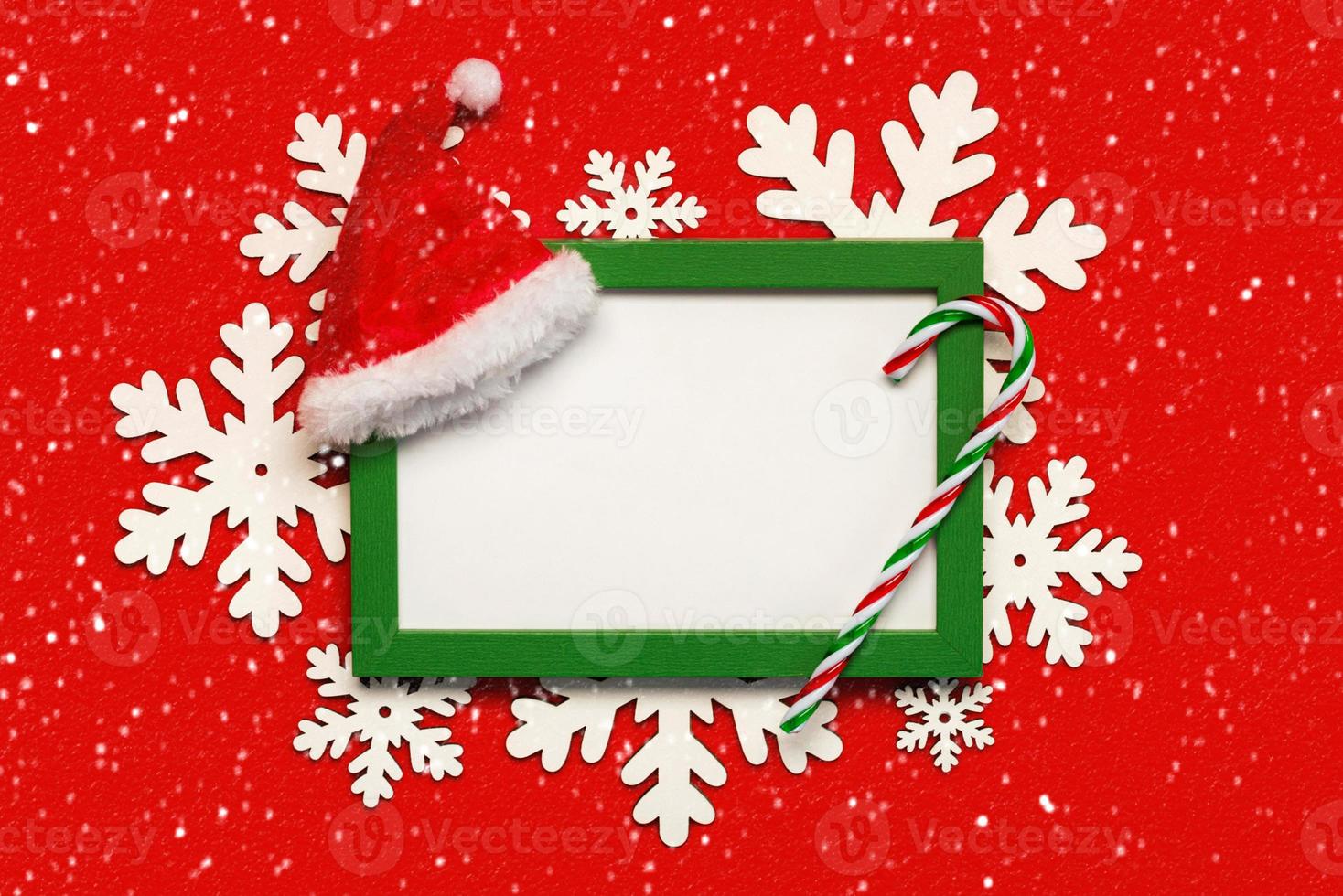 Merry Christmas. Green frame with white copy space, Christmas decoration and snowflakes. Christmas concept background photo