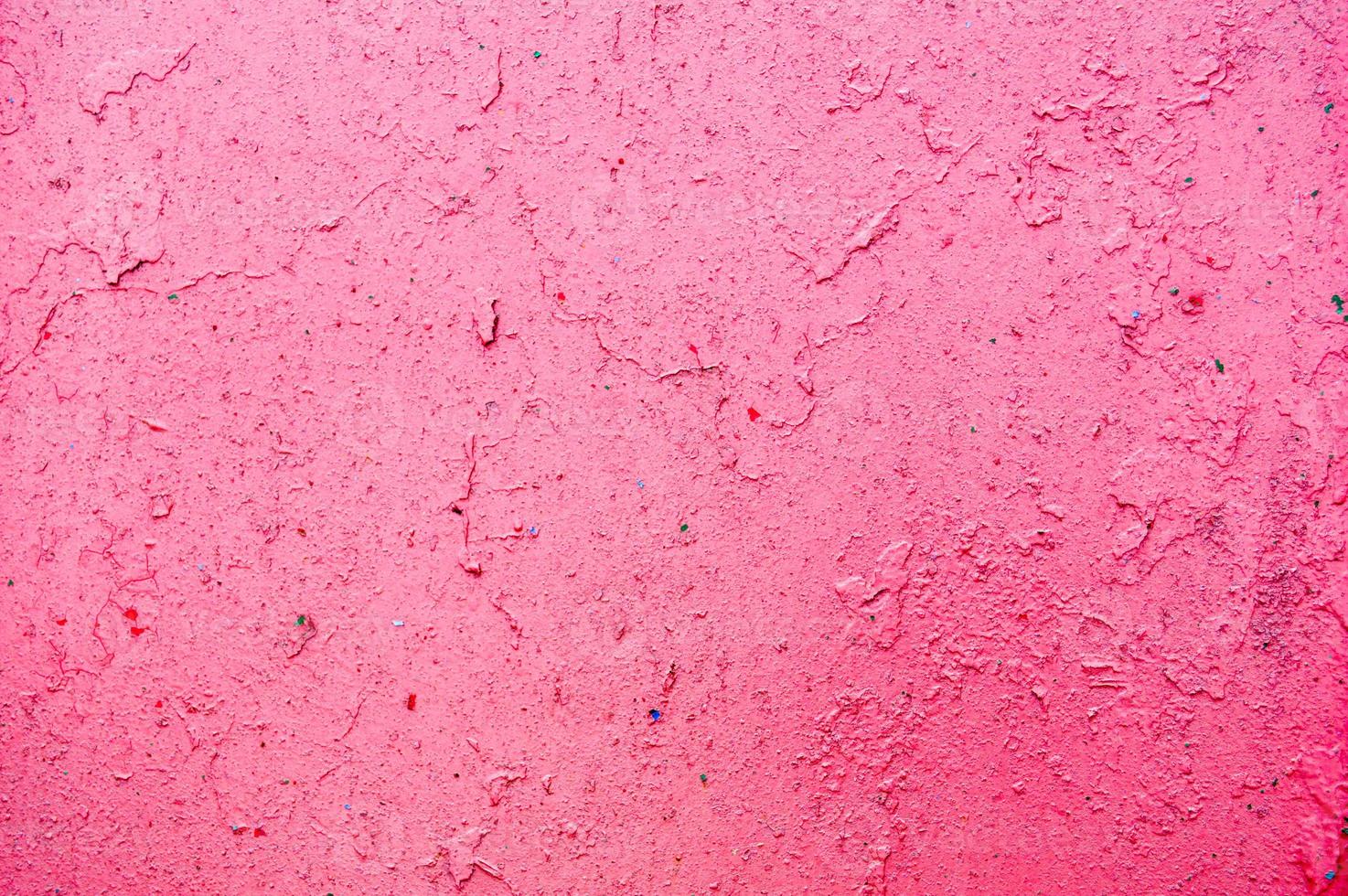 Texture of iron metal painted bright paint peeling paint old battered scratched cracked ancient rusty metal sheet wall with corrosion. The background photo