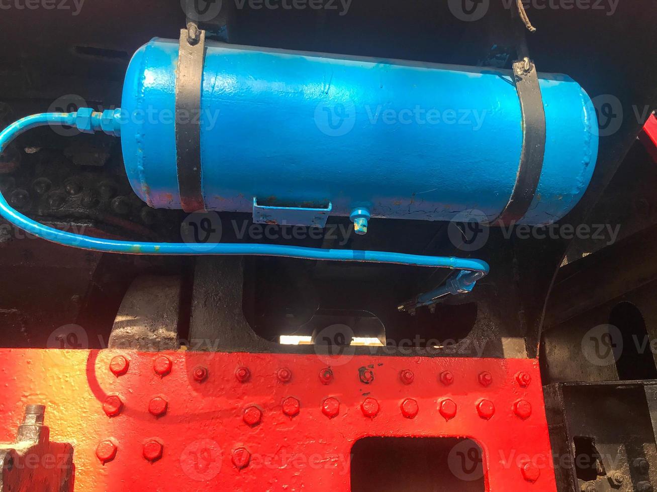 Large blue iron metal cylindrical industrial tank. Gas cylinder for storage of liquefied gas under pressure photo